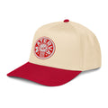 Materva Baseball Cap in red with a natural crown, angled front-left view